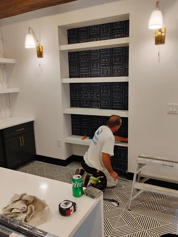 Residential room with a professionally wallpapered statement wall